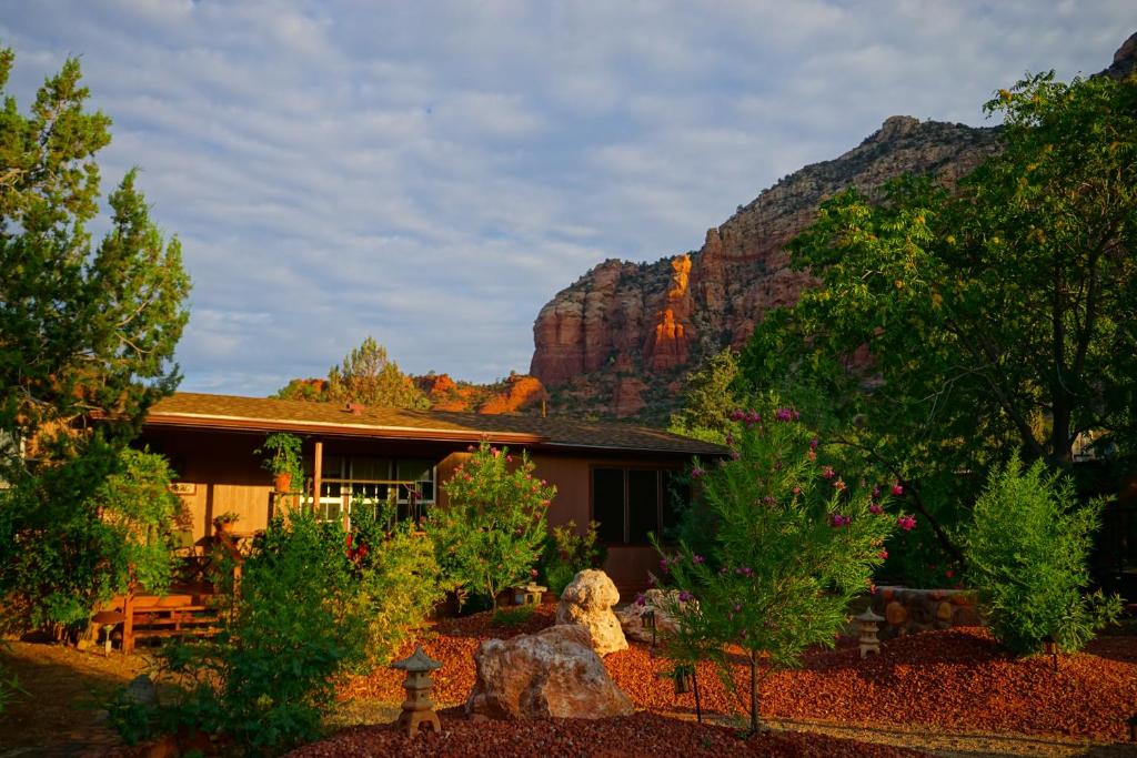a house with a mountain in the background at Sedona Room Homestay - Thunder Mountain in Sedona
