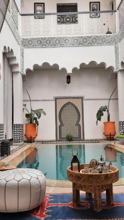 Bazén v ubytování Hotel Riad Amlal nebo v jeho okolí