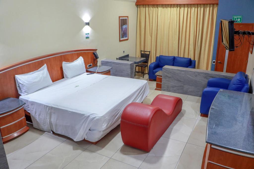 Postel nebo postele na pokoji v ubytování Autohotel Ilussion