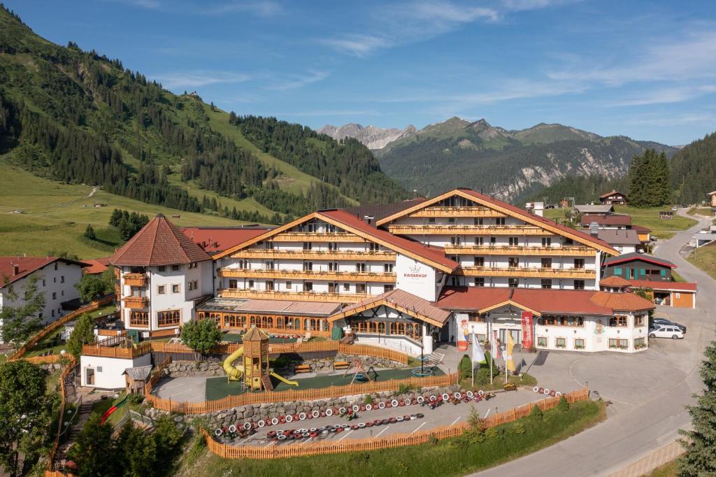 an aerial view of a resort in the mountains at Familotel Kaiserhof - Families only in Berwang