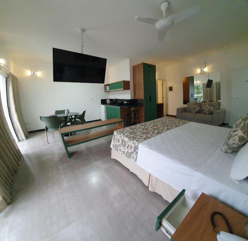 Cama ou camas em um quarto em Juquei Frente ao Mar Hotel Pousada