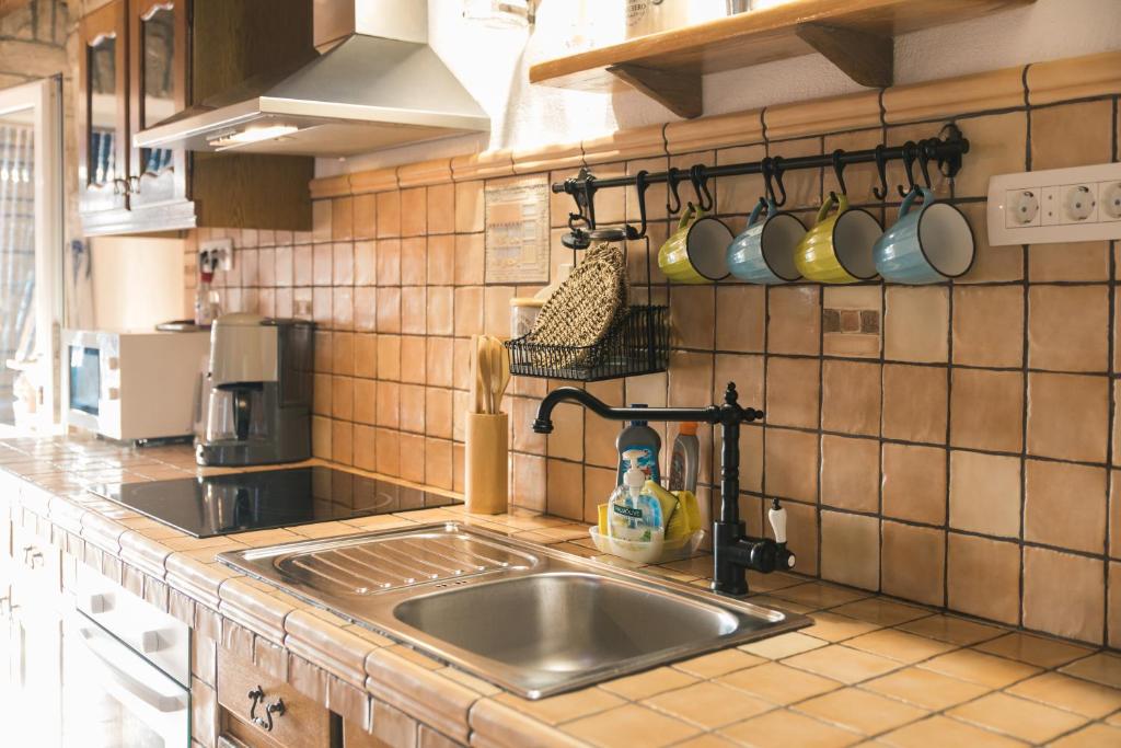 Kuchyňa alebo kuchynka v ubytovaní Rustic Apartment Mariva