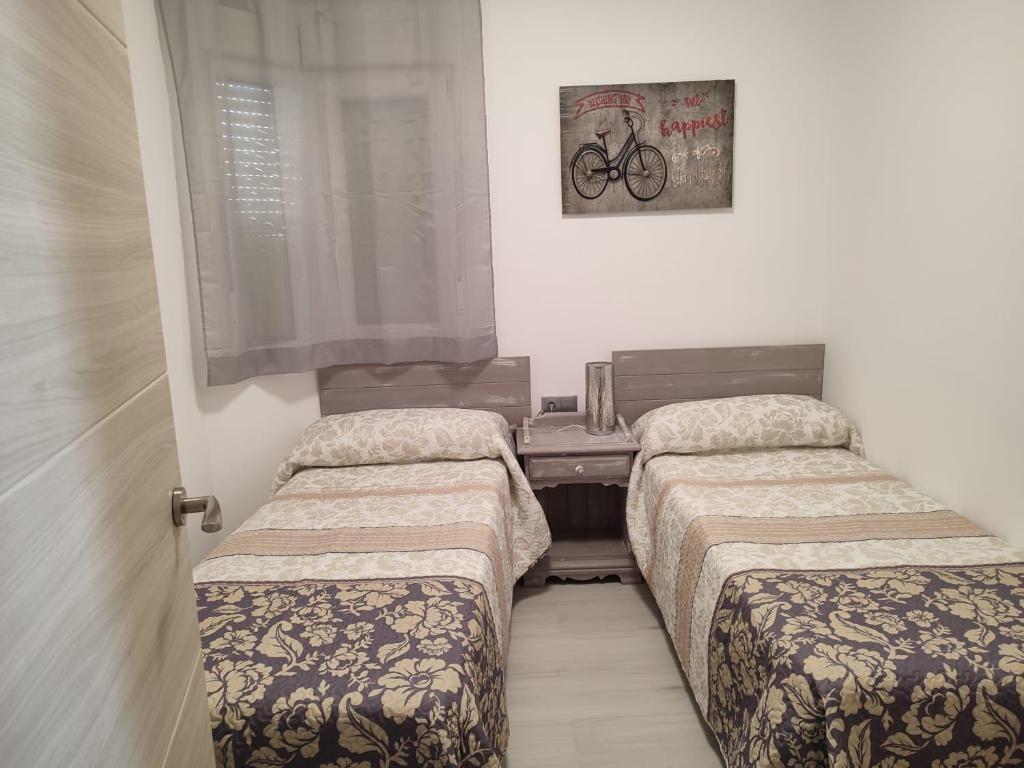 Posteľ alebo postele v izbe v ubytovaní Apartamento Espa