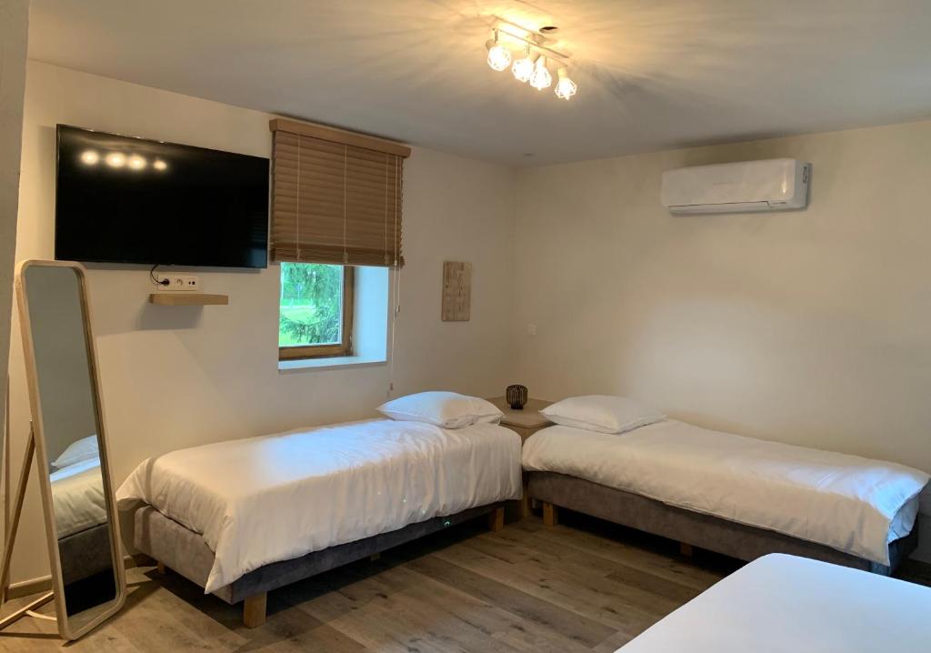 Postel nebo postele na pokoji v ubytování B&B elzartwinning
