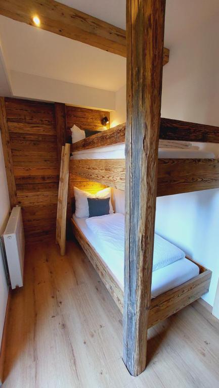 Postel nebo postele na pokoji v ubytování Alpenchalet Almrose