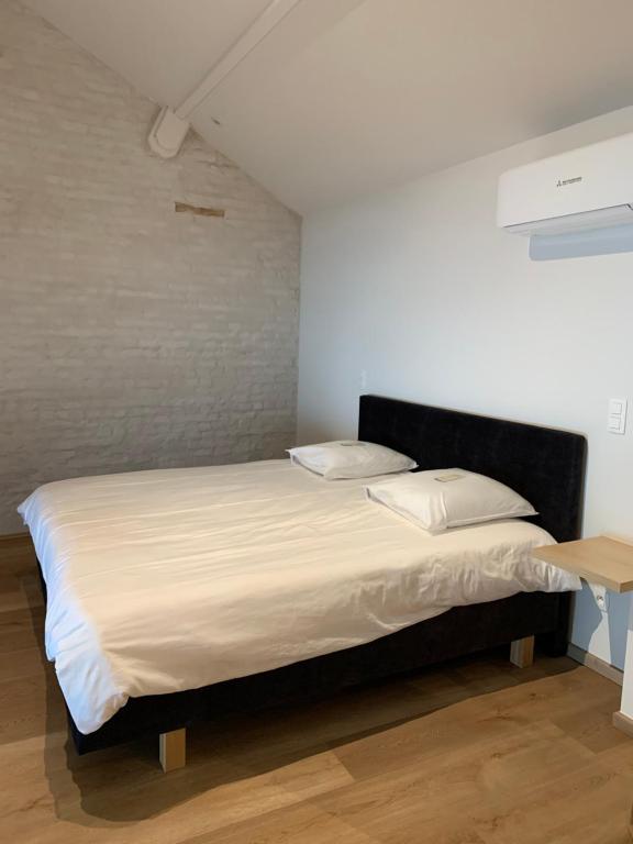 Postel nebo postele na pokoji v ubytování B&B elzartwinning