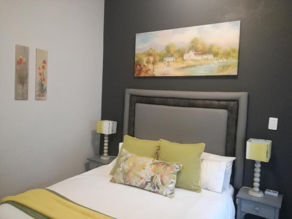 Letto o letti in una camera di The Garden Inn Guesthouse