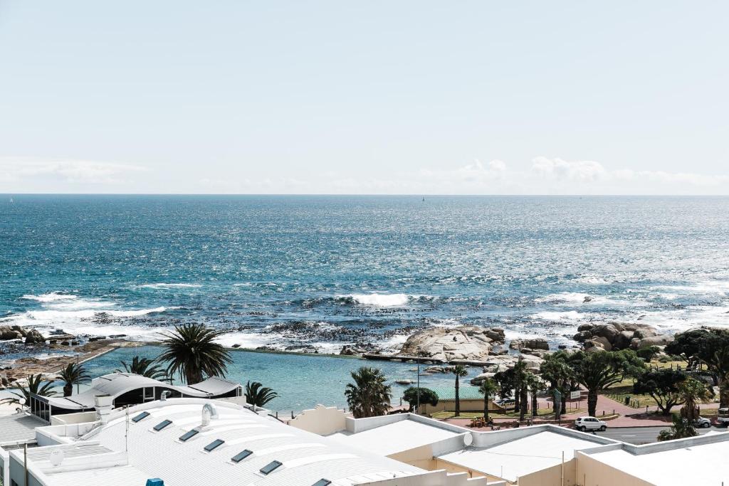 a view of the ocean from the balcony of a resort at Royal Boutique Hotel in Cape Town