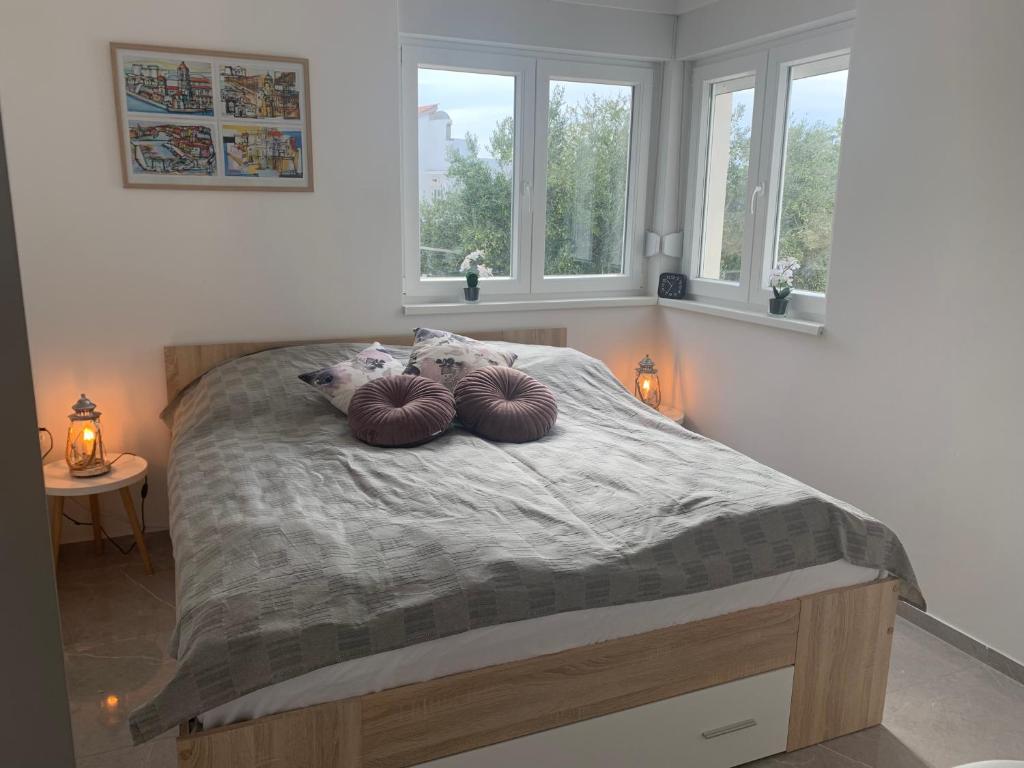 Postel nebo postele na pokoji v ubytování Villa Primosten