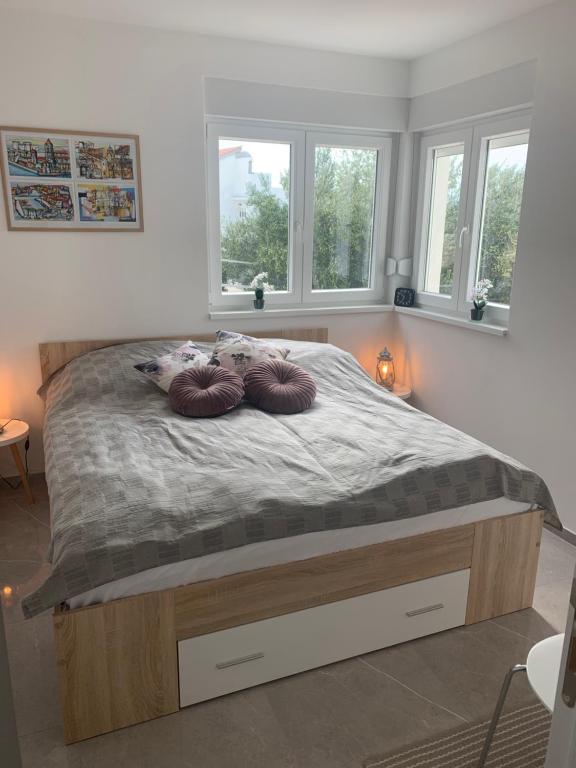 Postel nebo postele na pokoji v ubytování Villa Primosten