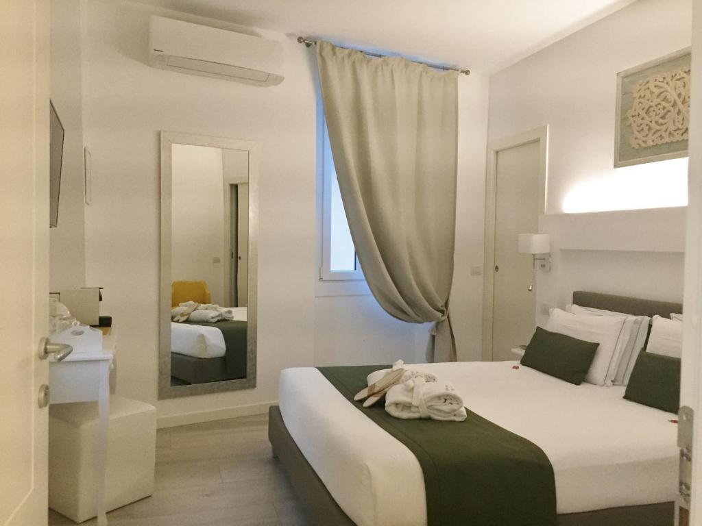 Postel nebo postele na pokoji v ubytování Residenza Elisa