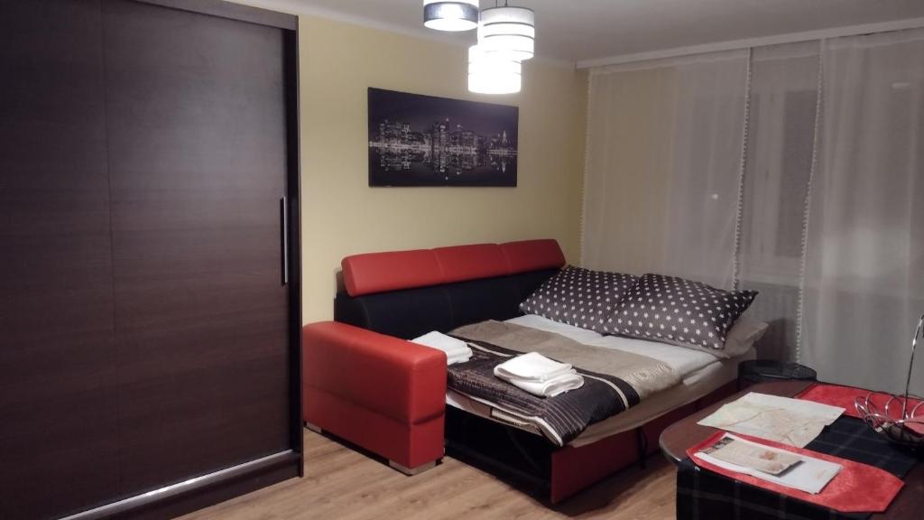 Posteľ alebo postele v izbe v ubytovaní Apartament Elegant