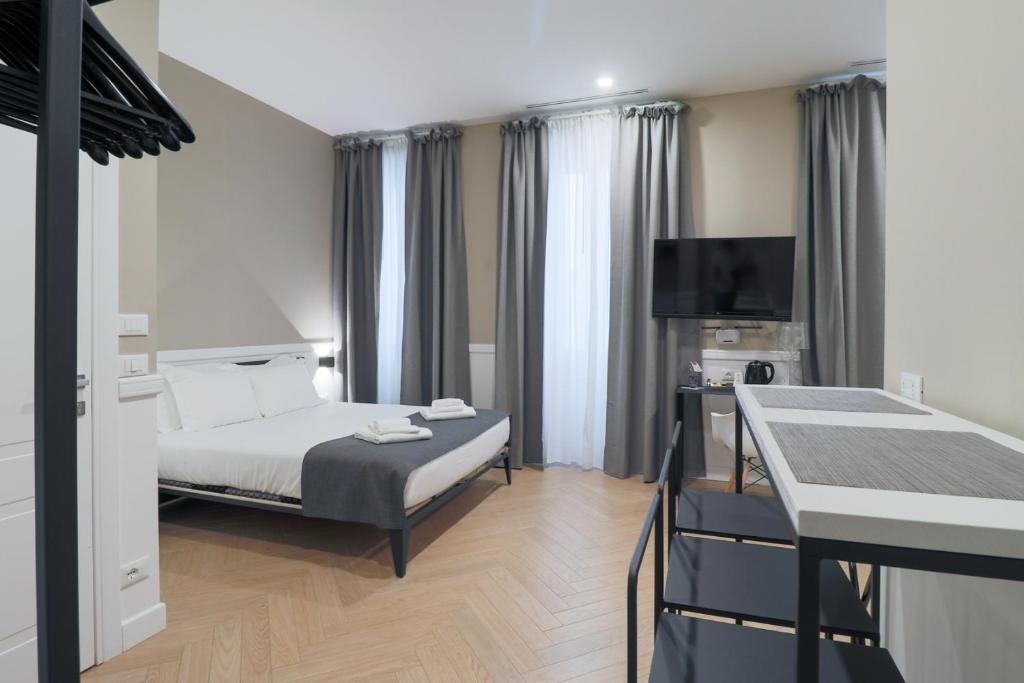 Łóżko lub łóżka w pokoju w obiekcie Elisabeth Boutique Rooms
