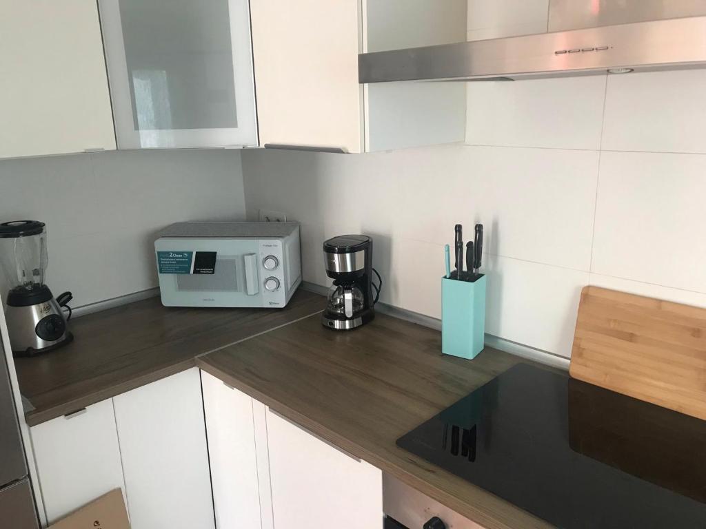 Kuchyň nebo kuchyňský kout v ubytování CASA BLANQUI