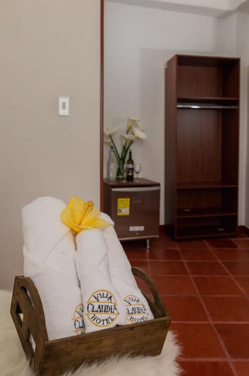 Postel nebo postele na pokoji v ubytování hotel villa claudia