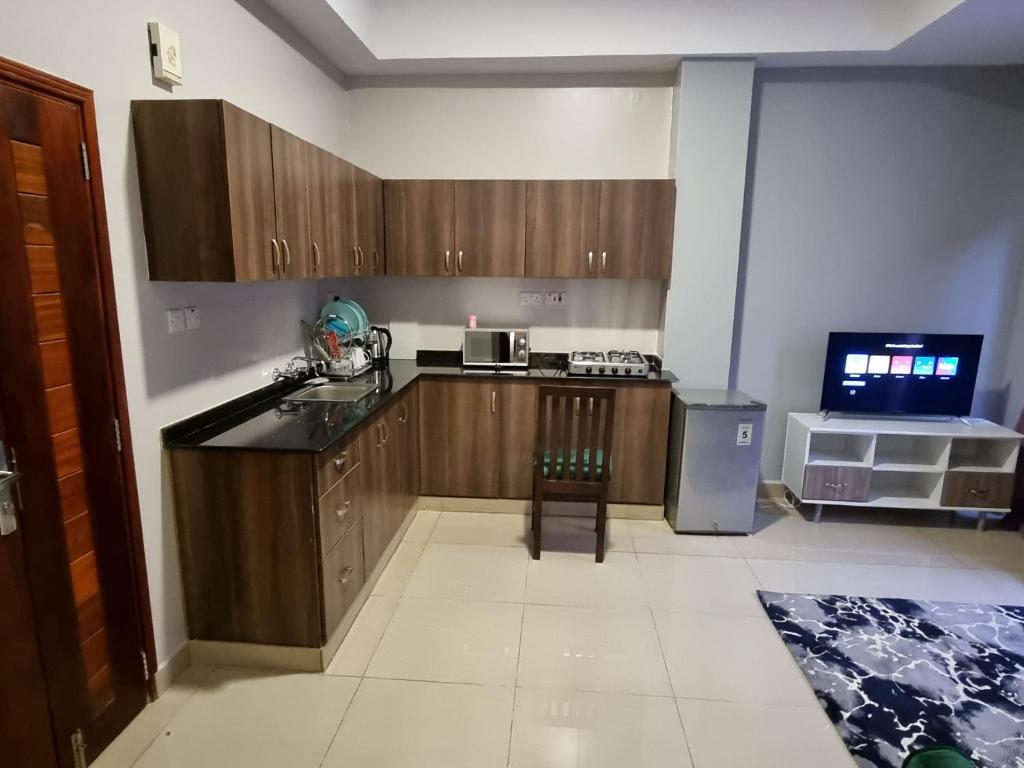 Köök või kööginurk majutusasutuses Eika Suites at Acacia