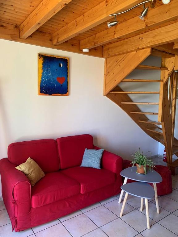 Posezení v ubytování Appartement dans chalet avec jardin, vue montagne