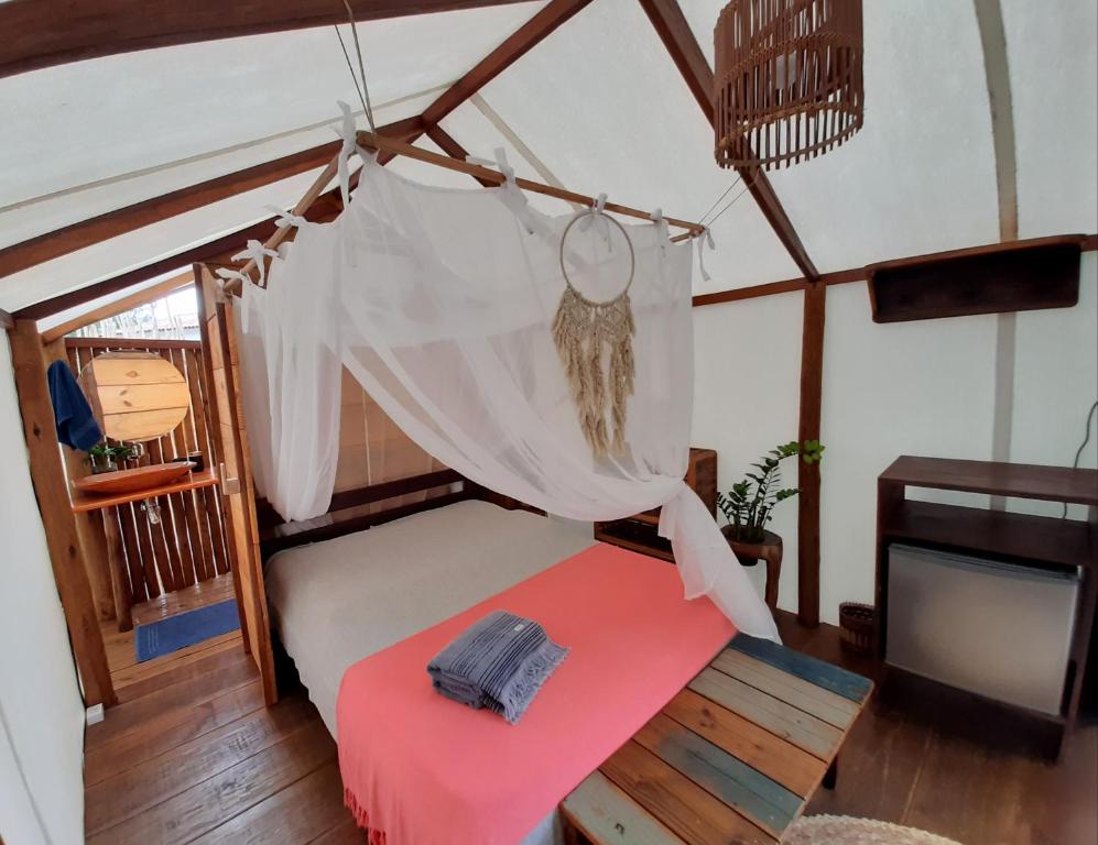 Postelja oz. postelje v sobi nastanitve Glamping Algodões