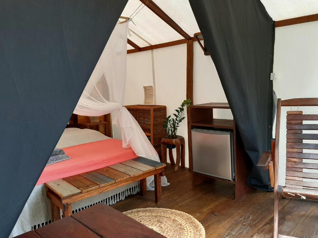 Postelja oz. postelje v sobi nastanitve Glamping Algodões