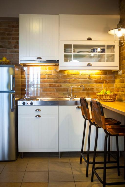 Kuchyň nebo kuchyňský kout v ubytování Villa Teresa Luxury Suites