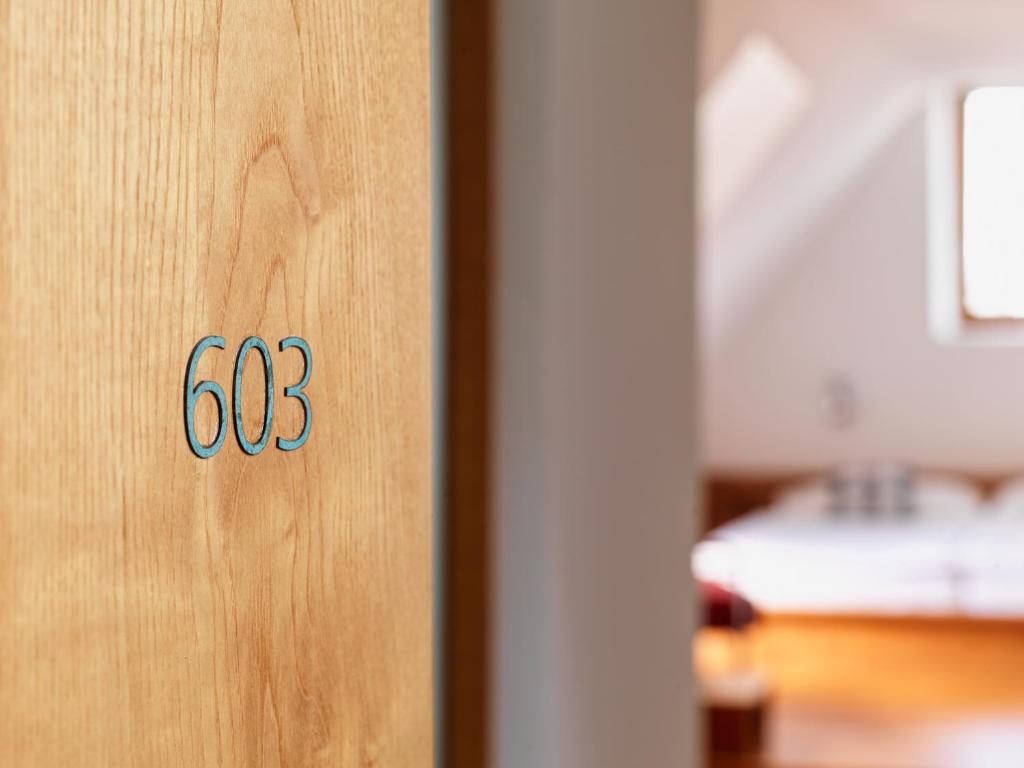 Postel nebo postele na pokoji v ubytování City-Hotel Ochsen