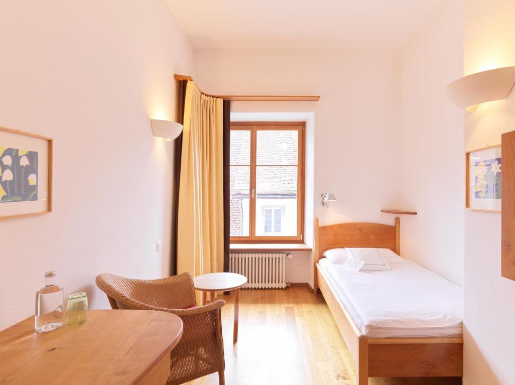 Postel nebo postele na pokoji v ubytování City-Hotel Ochsen