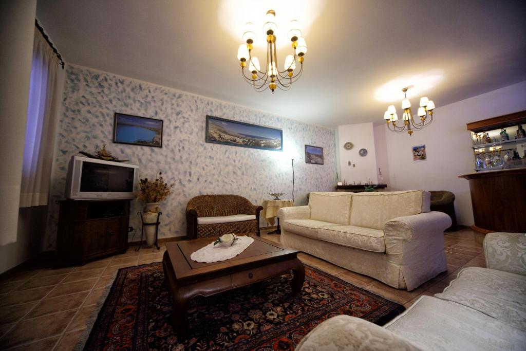 TV a/nebo společenská místnost v ubytování History Hotel