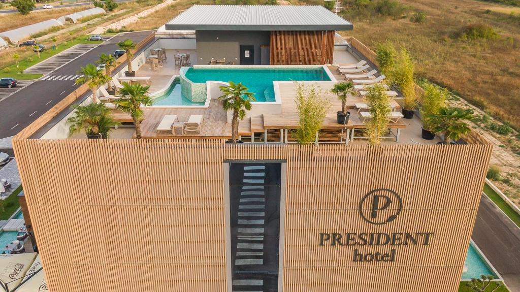 an overhead view of a resort with a sign that reads president hotel at Hotel President in Čapljina