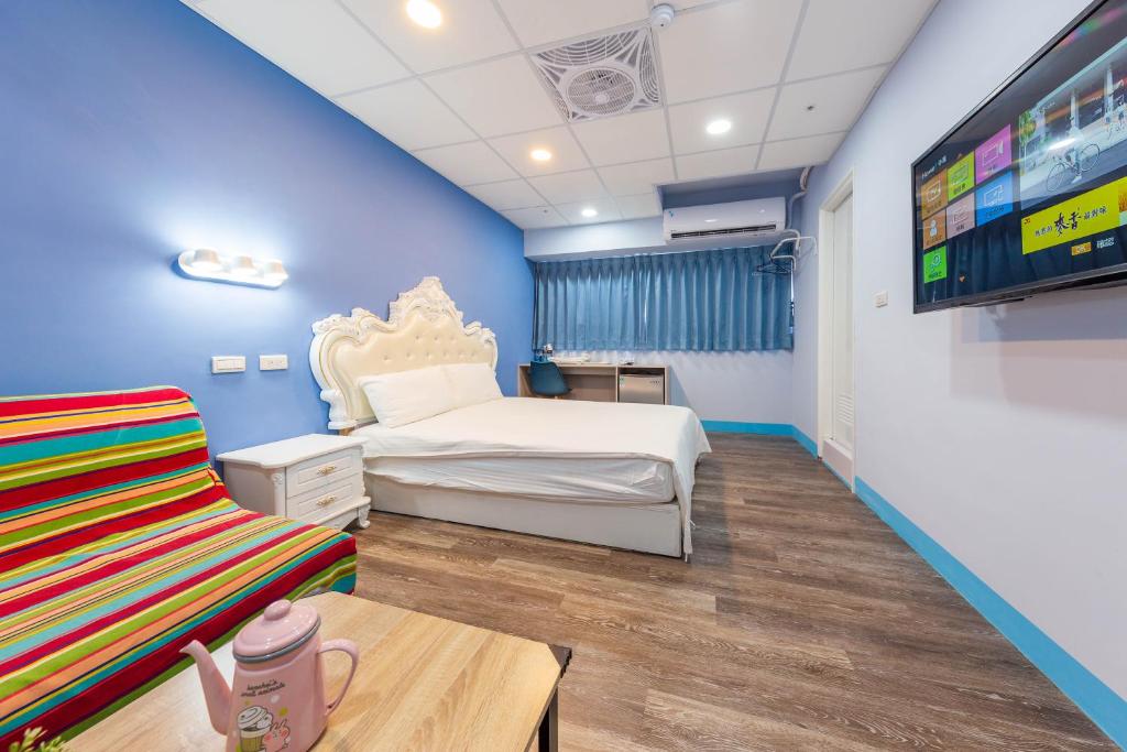 TV a/nebo společenská místnost v ubytování Liu He Su Hotel