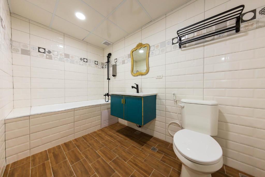 Koupelna v ubytování Liu He Su Hotel