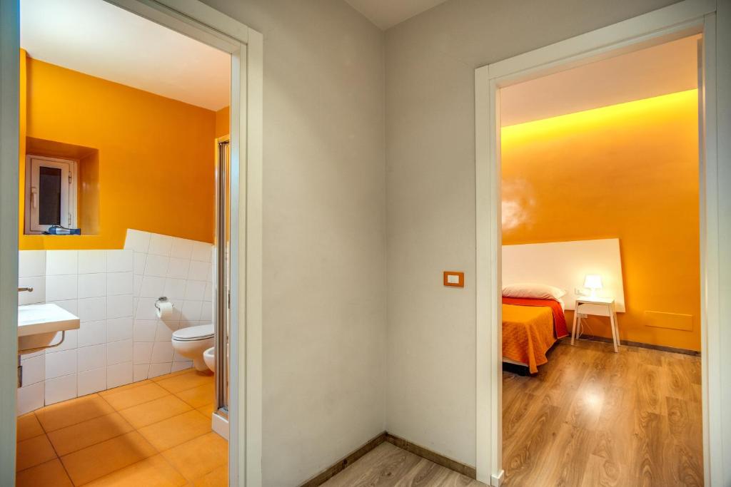 Posteľ alebo postele v izbe v ubytovaní Apartments Rione Trastevere XIII