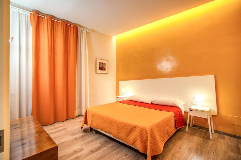 Posteľ alebo postele v izbe v ubytovaní Apartments Rione Trastevere XIII