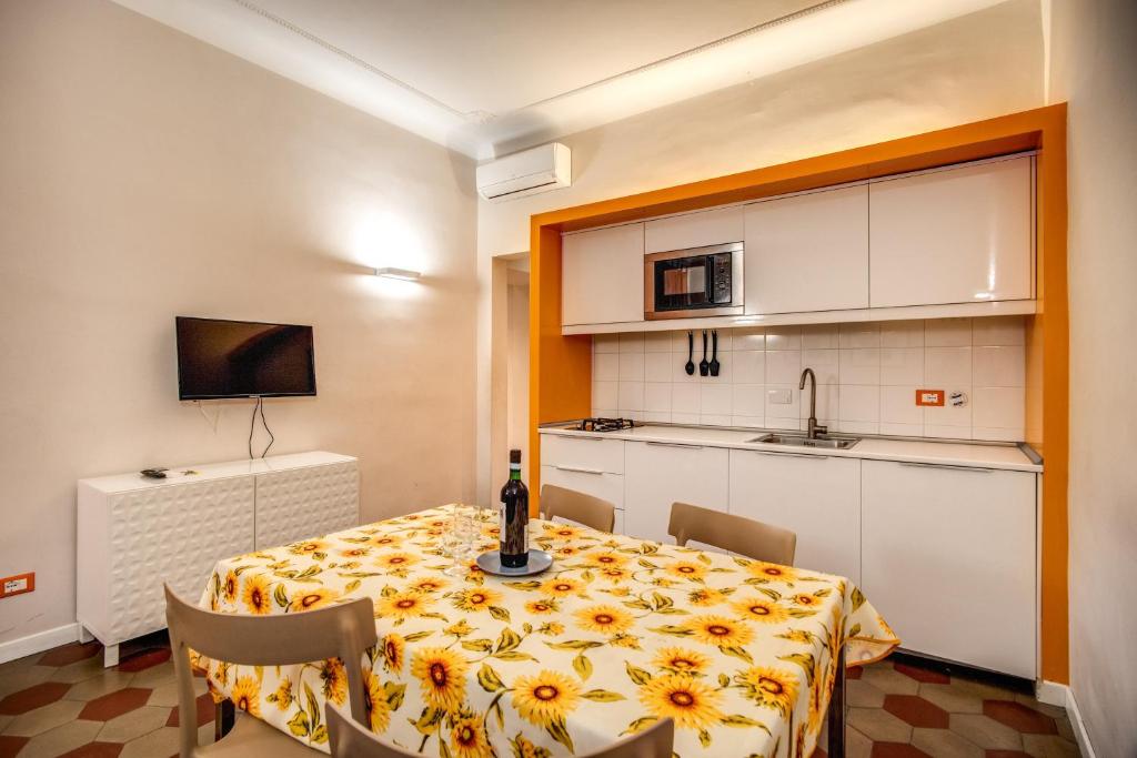 Kuchyňa alebo kuchynka v ubytovaní Apartments Rione Trastevere XIII