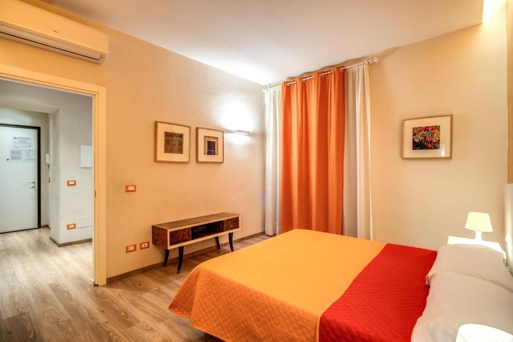 Posteľ alebo postele v izbe v ubytovaní Apartments Rione Trastevere XIII