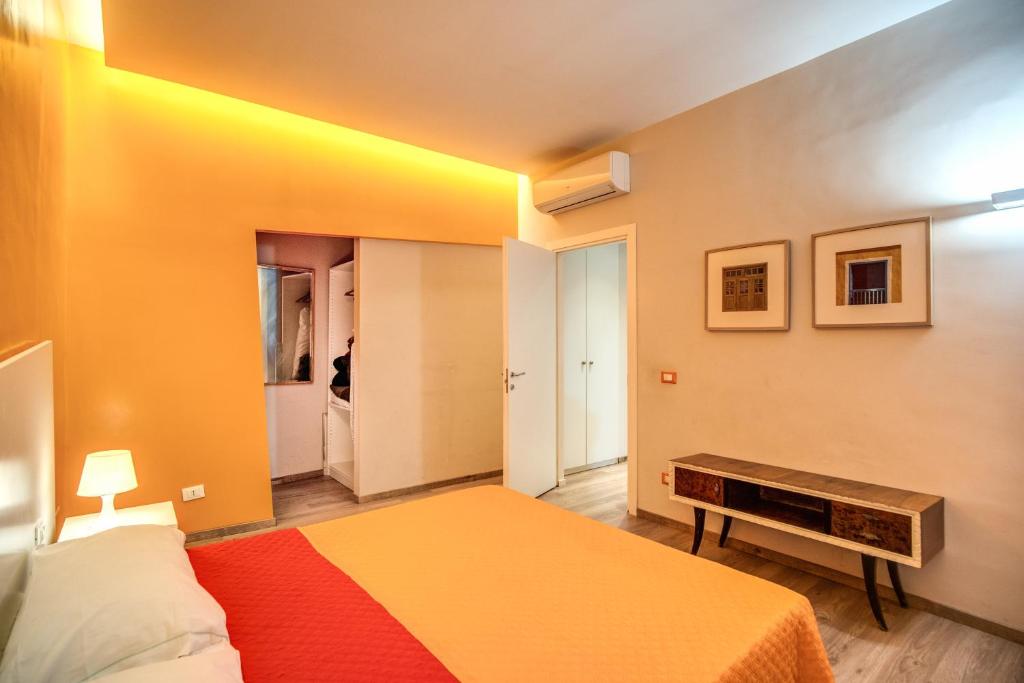 Posteľ alebo postele v izbe v ubytovaní Apartments Rione Trastevere XIII