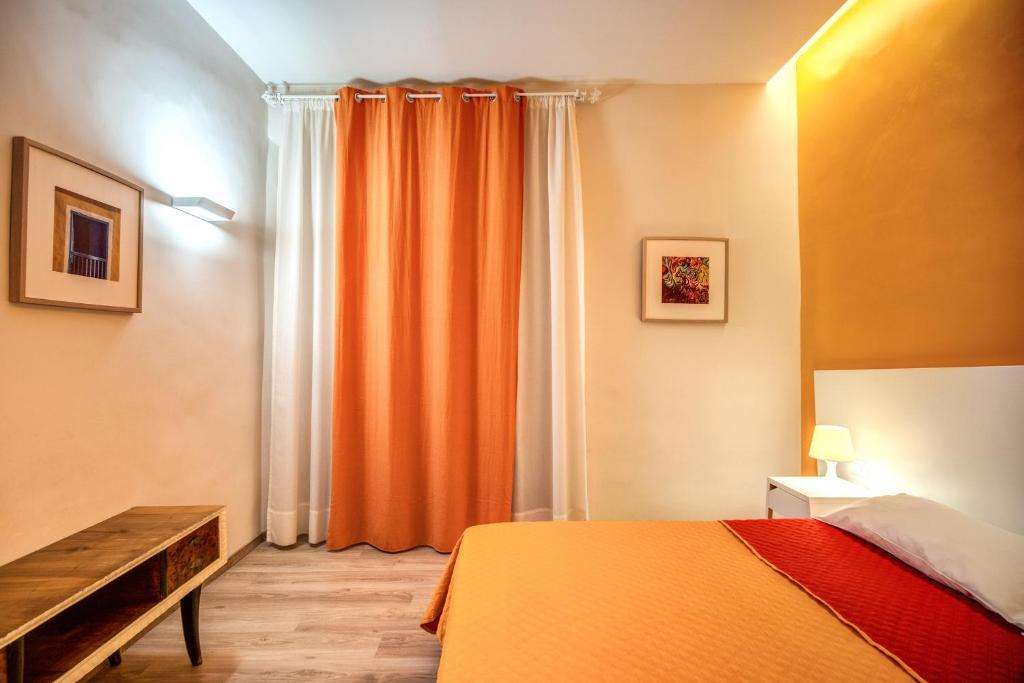 Posteľ alebo postele v izbe v ubytovaní Apartments Rione Trastevere XIII