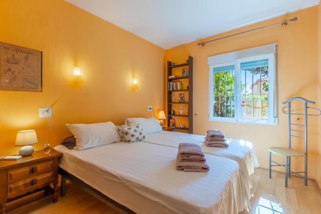 A bed or beds in a room at Casa dos Leones