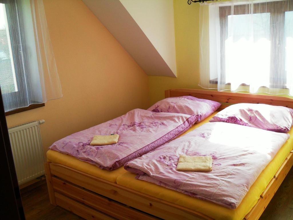 Postel nebo postele na pokoji v ubytování Ubytování Macků