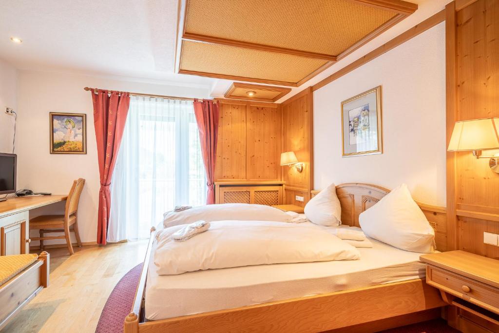 Łóżko lub łóżka w pokoju w obiekcie Dietrich Comfort Appartements