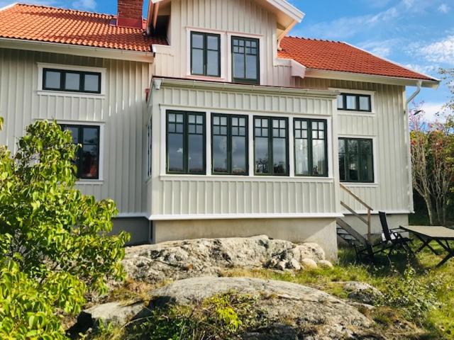 a house with a rock in front of it at Nära Kvarnen-Mollösund in Mollösund