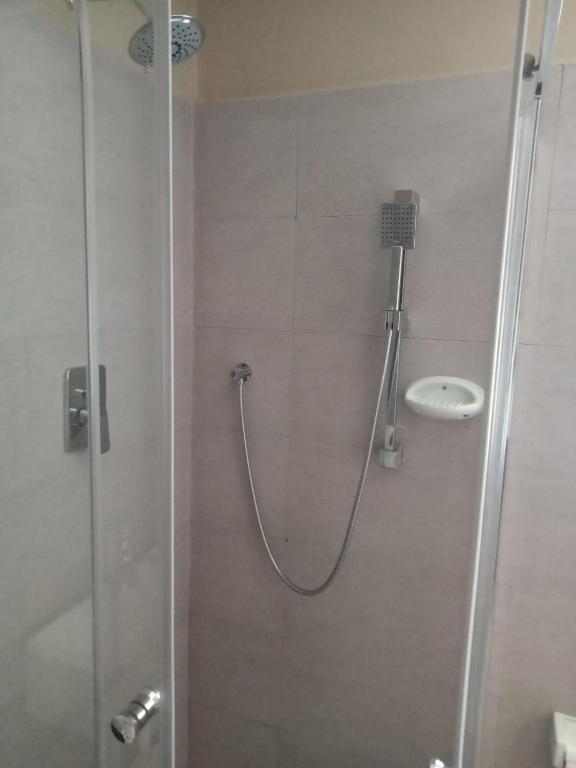a bathroom with a shower and a sink at El Sueno Homestay in Naivasha