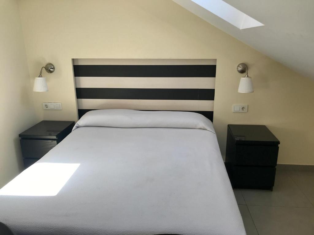 Posteľ alebo postele v izbe v ubytovaní Hotel Domus