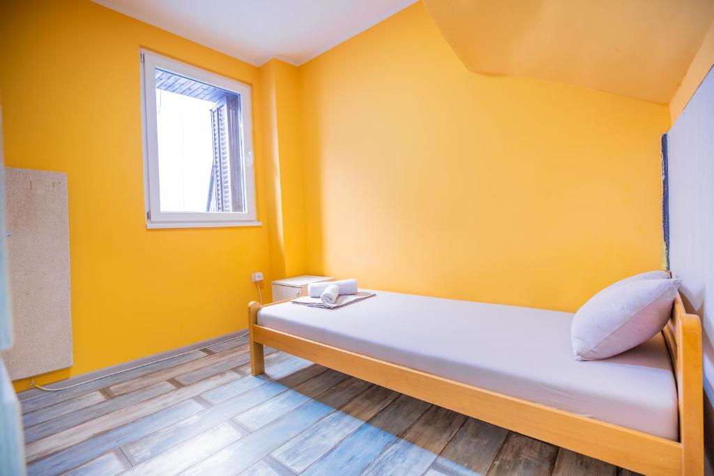 Postel nebo postele na pokoji v ubytování Passenger Hostel