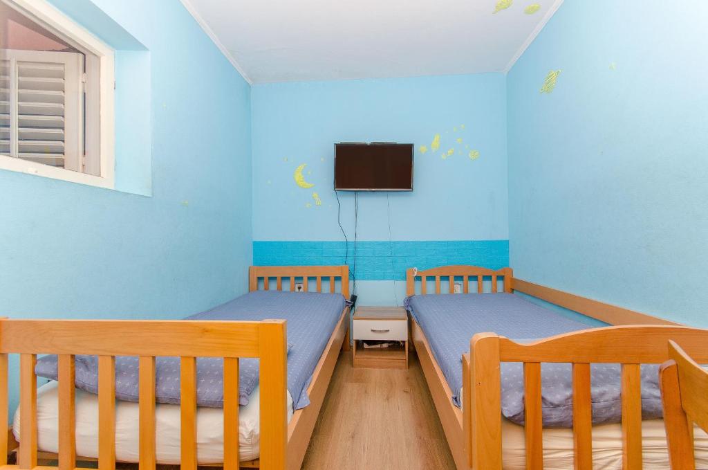 TV a/nebo společenská místnost v ubytování Apartments Ivan