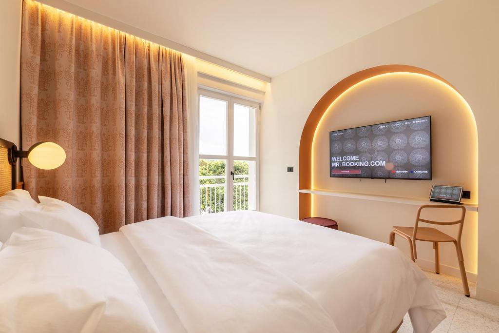 Postelja oz. postelje v sobi nastanitve Hotel Grand Koper