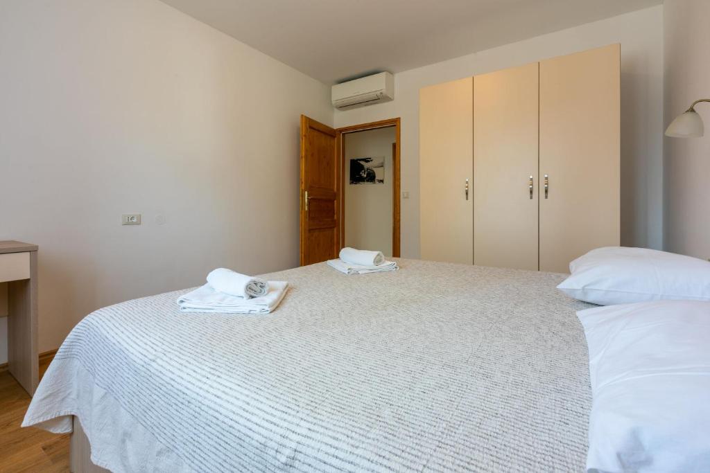 Postel nebo postele na pokoji v ubytování House Marija