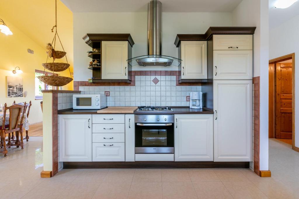 Kuchyň nebo kuchyňský kout v ubytování House Marija
