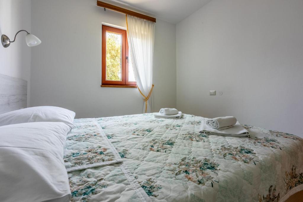 Postel nebo postele na pokoji v ubytování House Marija