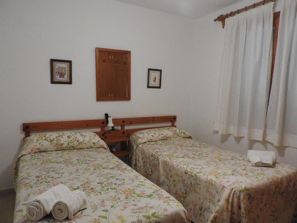Postel nebo postele na pokoji v ubytování Apartamentos Jardin Playa