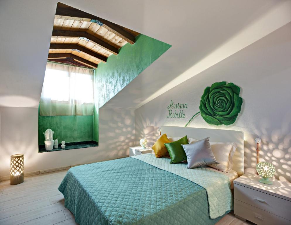 Łóżko lub łóżka w pokoju w obiekcie Casa Vacanze Matelda